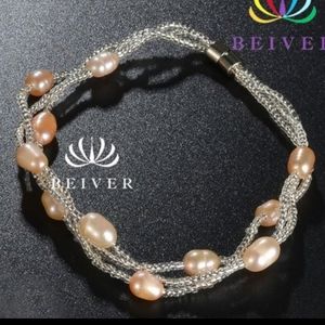Pearl earrings and bracelet set.